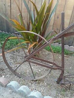 Antique hand plow push tiller cultivator with extra attachment