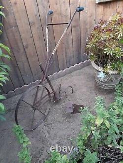 Antique hand plow push tiller cultivator with extra attachment