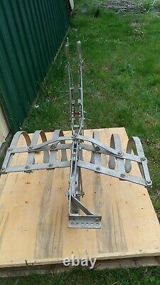 Vintage one horse drawn cultivator for garden with single tree
